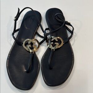 Gucci Black Sandals with Gold Accents